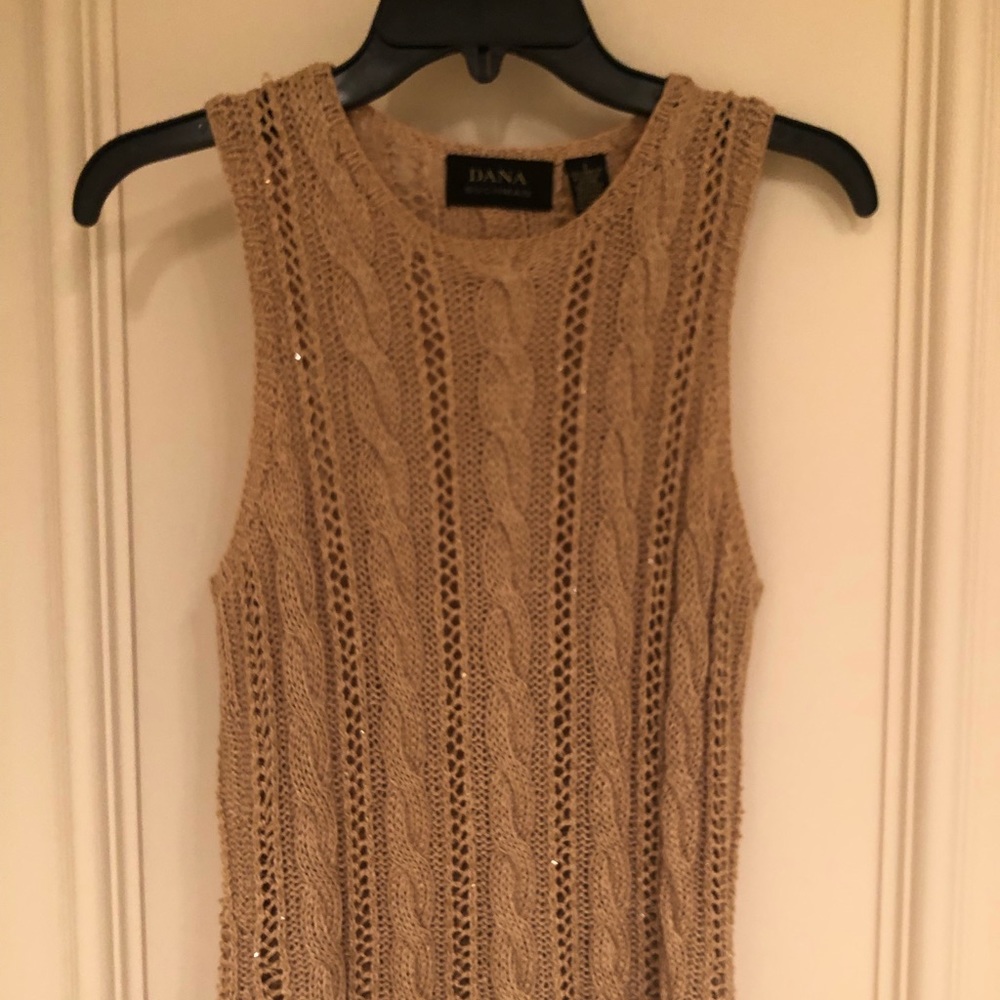 Dana Buchanan gold sleeveless layering sweater.